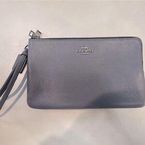 New Coach wristlet. Light grey/blue with silver zipper and pulls.